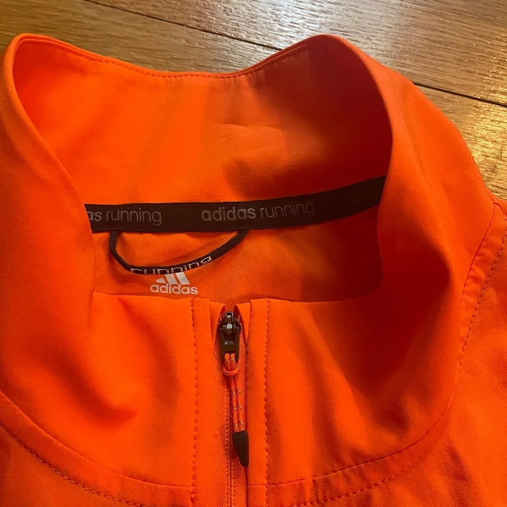 ADIDAS “supernova” lightweight running zip up jacket /orange w/reflective thread